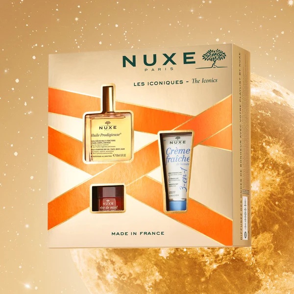 Set Nuxe The Iconics: Ulei Multifunctional Huile Prodigieuse Or pentru Fata, Corp si Par, 50 ml + Crema Hidratanta Creme Fraiche de Beaute pentru Fata, 30 ml + Balsam de Buze cu Miere Reve de Miel, 15 g