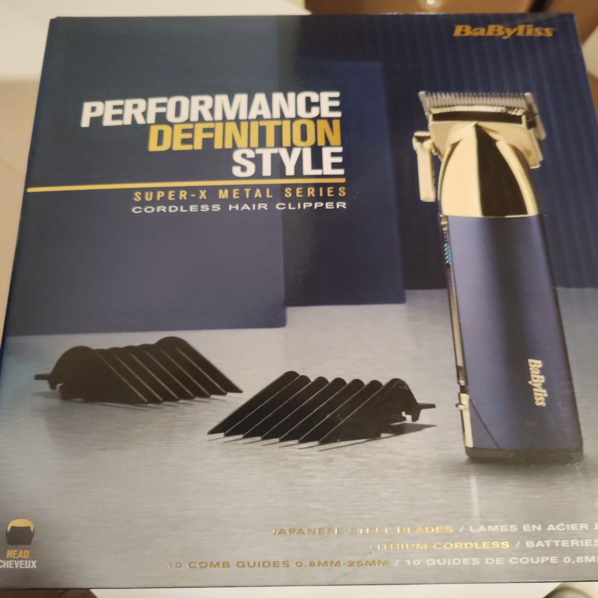 Aparat de tuns parul Super-X Metal BaByliss E992E , 12 Accesorii, 3 ore, 1,5-25mm , 10 pozitii, Otel Japonez,Husa, Auriu-Albastru Marin, Resigilat,