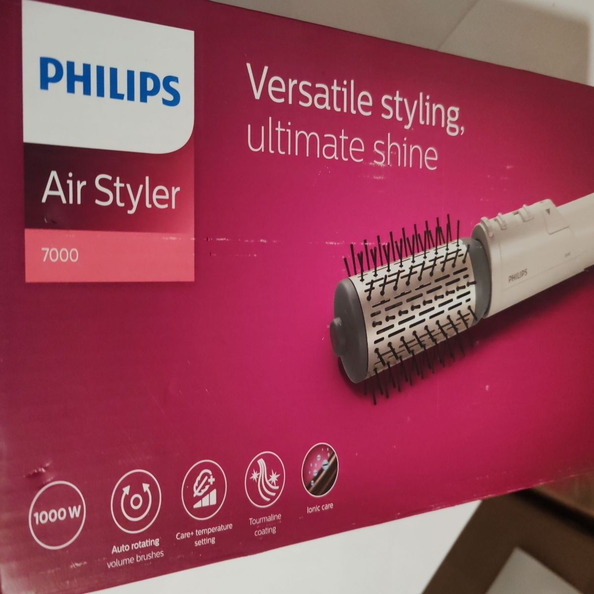 Perie rotativa cu aer cald Philips Seria 7000 BHA710/00, 1000W, ingrijire cu ioni, 2 accesorii, setare temperatura de ingrijire, peri naturali,