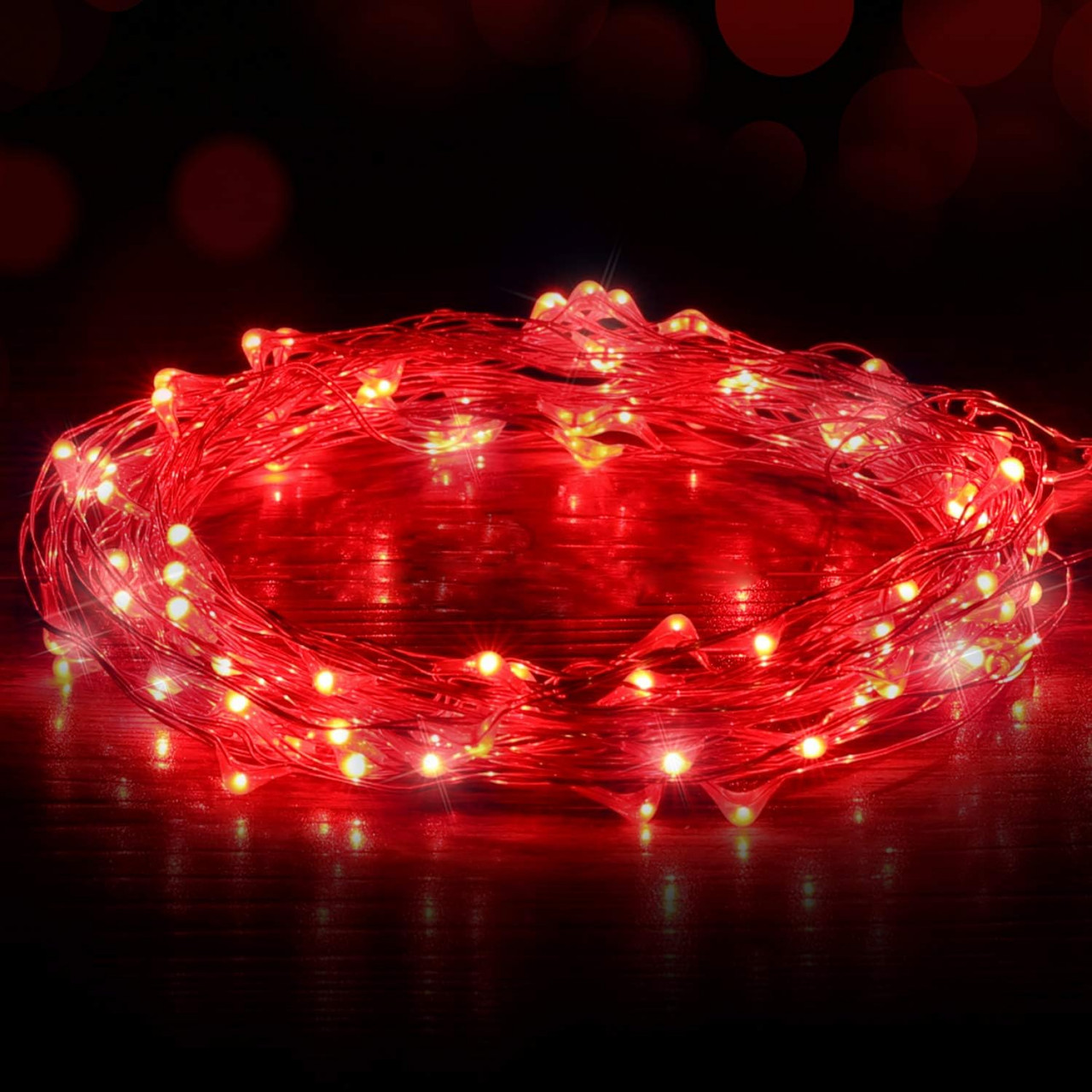Instalatie cu 100 de LED-uri Ariceleo, plastic/cupru, rosu, 10 m 100 Decorațiuni de Crăciun
